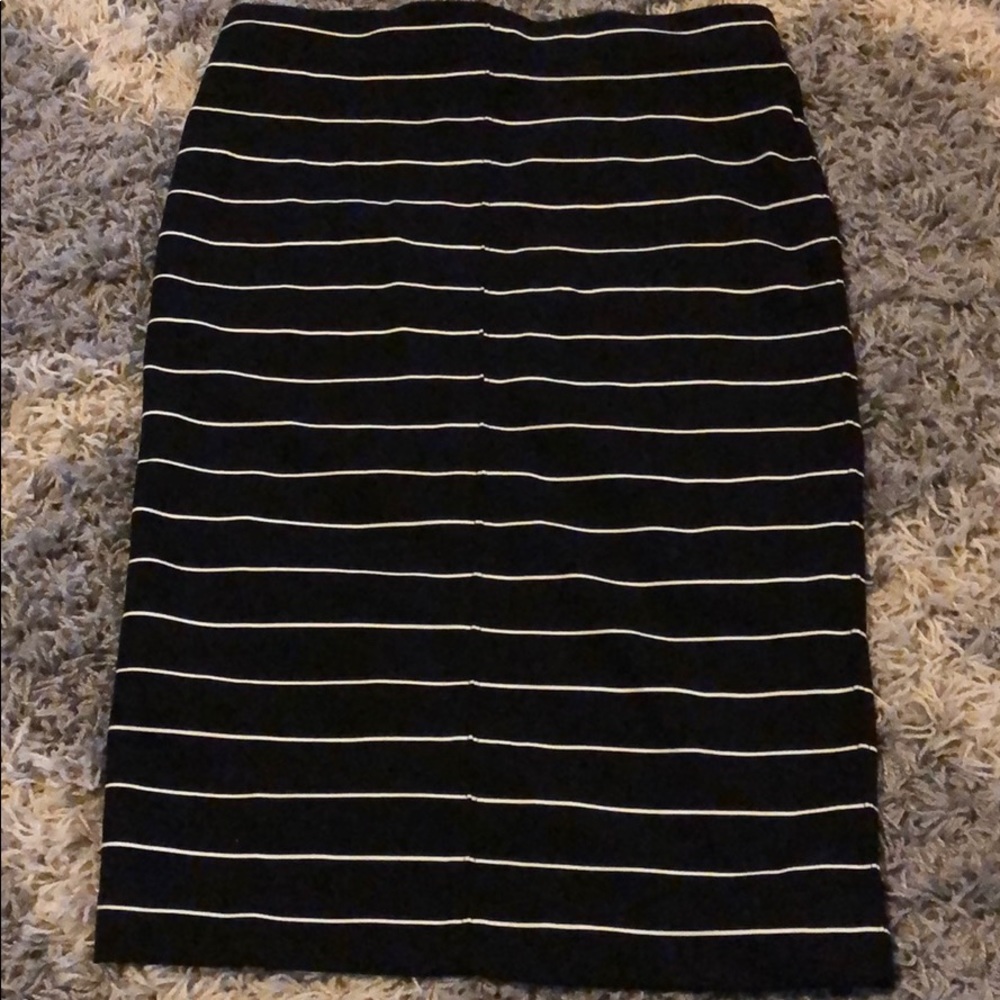 Knee length black and white stripe skirt